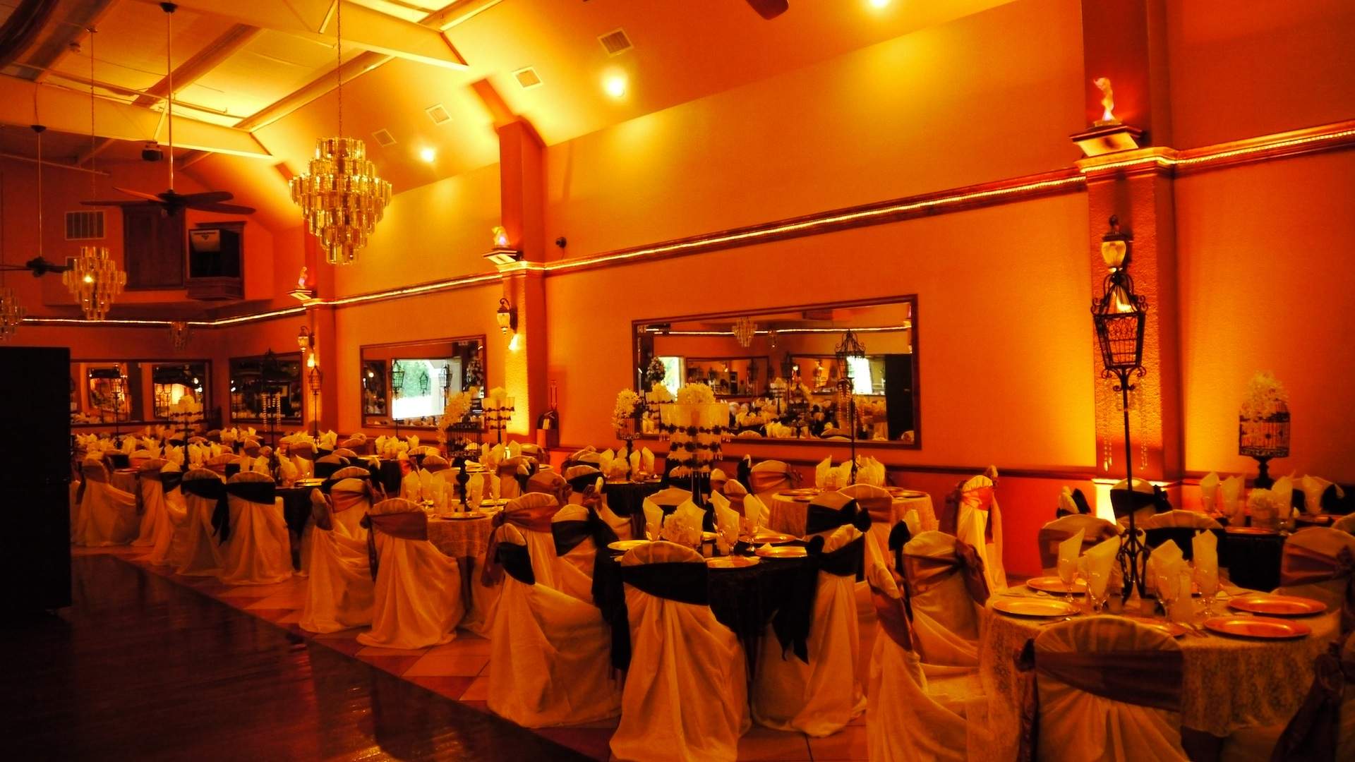 Herreras Reception Hall Amber LED Uplights Full Side Wall From Entrance